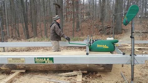 Optional slabbing attachment allows for 60" wide slabs. . Swing blade sawmill kit